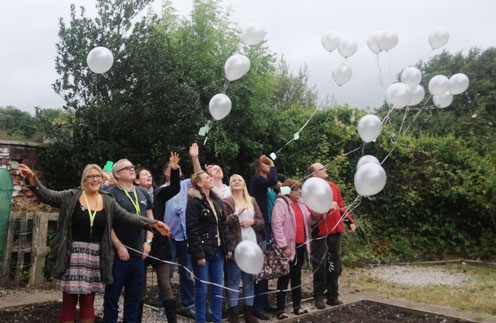 Staff, volunteers and service users at CRI Burnley